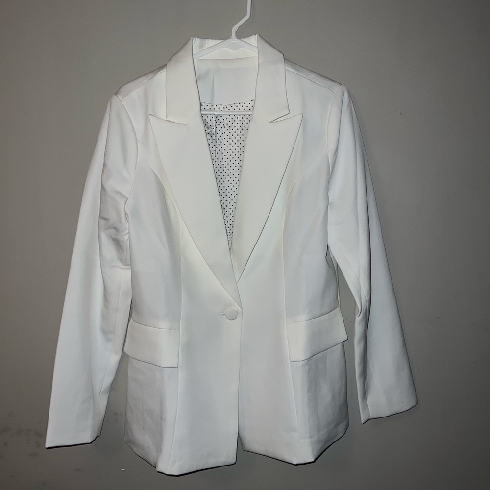 White blazer,silk lining with black polka dots.